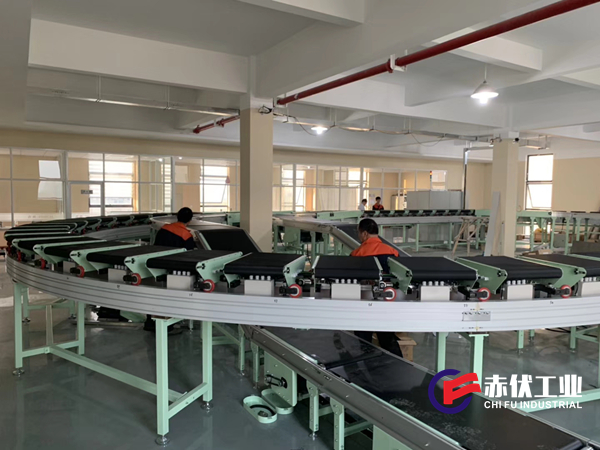 交叉帶式自動分揀線(圖1) 交叉帶式自動分揀線(圖1)